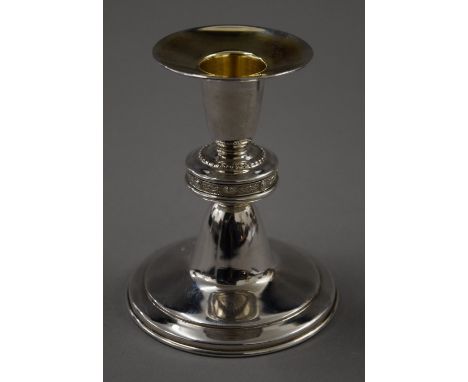 A boxed 'Lindisfarne Decoration' silver candlestick, retailed by Reid and Sons - Newcastle Upon Tyne. 10 cm high. 66.1 gramme