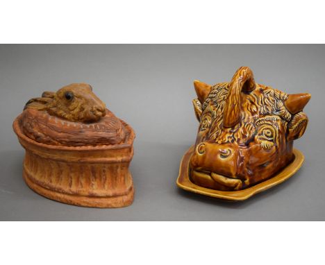 A game pie dish with hare's head finial and a butter dish formed as a bull's head. The latter 16 cm high.