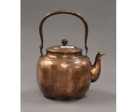 A Japanese copper teapot. 26 cm high overall.