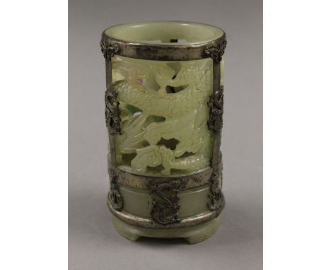A jade brush pot with metal mount. 13 cm high.