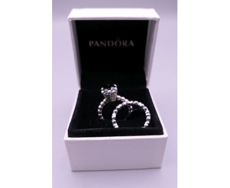 A pair of silver Pandora bubble rings in a Pandora ring box. Ring size K/L and J/K. 