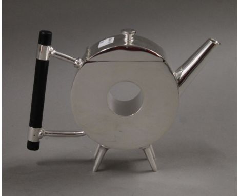 A Christopher Dresser style teapot. 13.5 cm high.