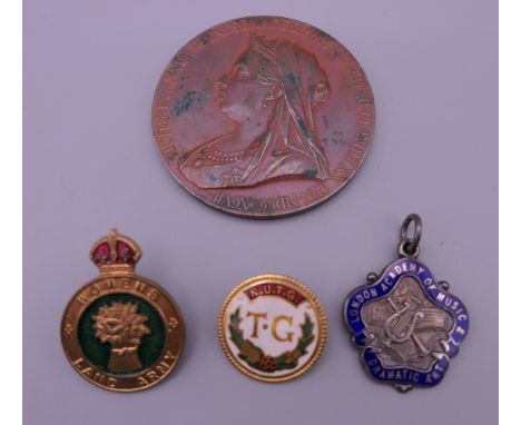 A Victorian Golden Jubilee medallion, two enamel badges, and an enamel and silver pendant.  