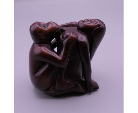 An erotic wooden netsuke. 5 cm high.