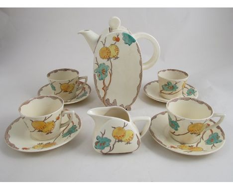 A Clarice Cliff Coffee set including coffee pot, six cups and saucers and jug, Pomegranate Design