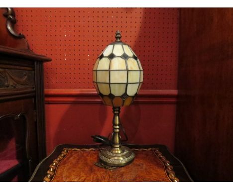 A Tiffany style coloured lead glazed table lamp