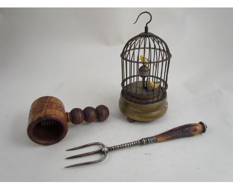 A bird in cage Automaton mechanical clock, treen nutcracker and toasting fork (3)