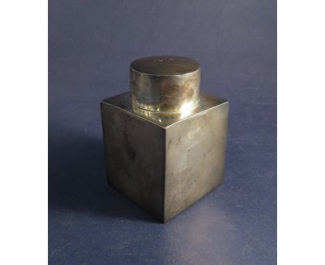A silver tea caddy of square-form, date engraved to lid 1915, Birmingham 1913