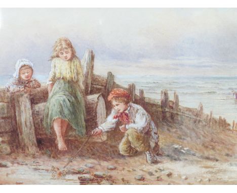 MYLES BIRKET FOSTER (1825-1899) Watercolour, three children rock pooling on beach, young boy teasing crab with a stick, three