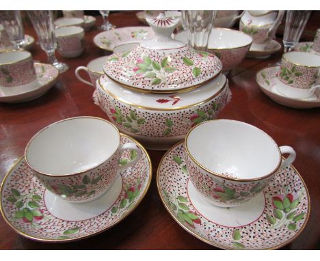 A Newhall porcelain extensive part tea and coffee service painted in puce, pink, iron red and greens with blooms and berried 