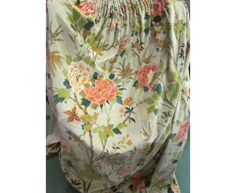 A pair of vintage floral velvet curtains 