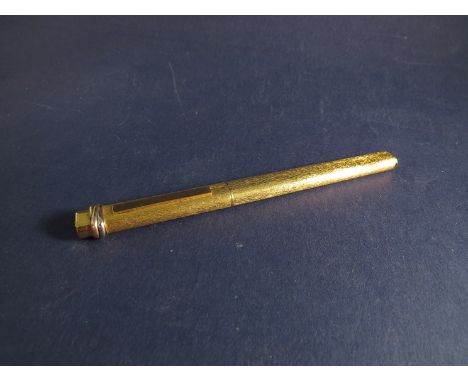 A 9ct gold Cartier pen with refills 