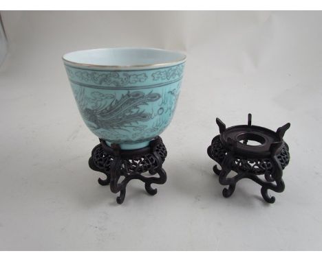 Two 20th Century Chinese cups on stands with decanter, marks to base a/f