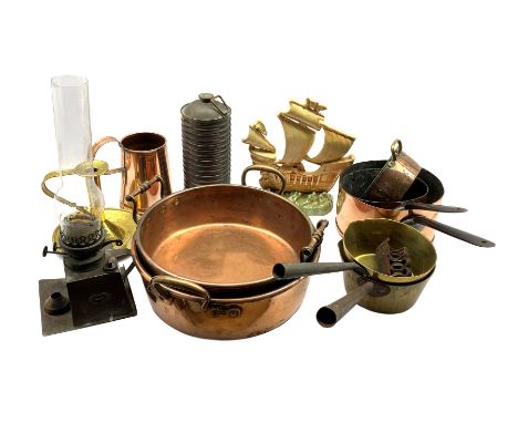 Various 19th Century and later copper and brass pans, cast metal oil lamp by the Lamp Manufacturing Company and other metalwa
