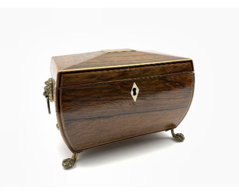 Regency rosewood two division tea caddy of sarcophagus form, brass lion mask handles above paw feet, L20cm - Condition Report