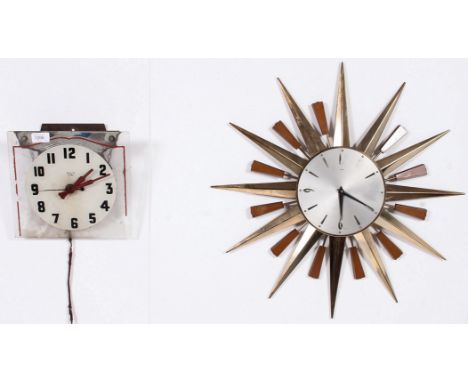 A Metamec retro sunburst clock together with a Smiths Sectric glass wall clock circa 1950's  both removed from a car garage.