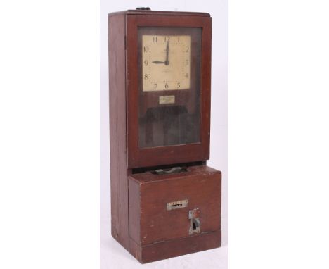 An Industrial mid century National Time Recorder Co Ltd clocking in clock, Roman numerals, seven day clock, set in oak case, 