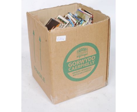 A large box of assorted vintage postcards - likely several thousands
