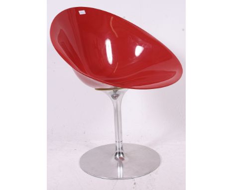 An original retro vintage Kartell Ero red plastic swivel chair - shaped plastic seat on a swivel chrome base.