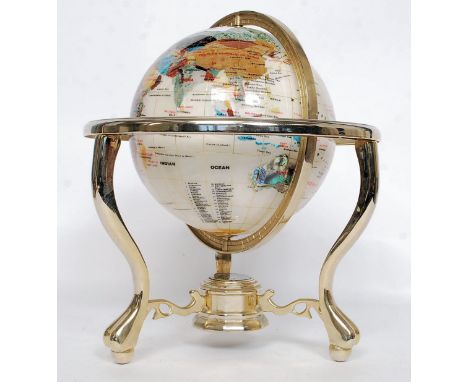 A large 20th century gemstone multi stone made globe, on a brass surround. L34cm 