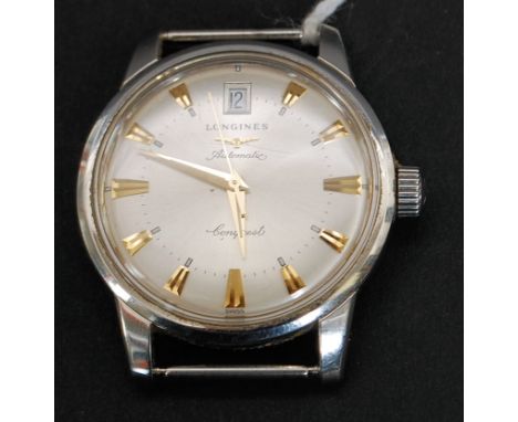 A vintage gentlemans Longines Conquest Automatic stainless steel wristwatch. The Silvered dial with gilt faceted batons & lum