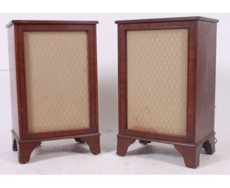 An excellent pair of 1970's mahogany cased freestanding hi-fi speakers having fabric and trellis work speaker facias