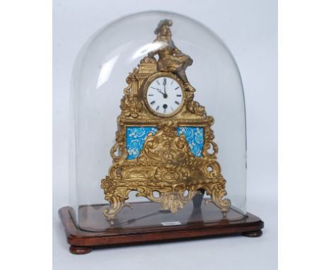 A French 19th century large gilt metal mantel clock by Leroy A Paris The enamel painted face with Roman numerals having inset