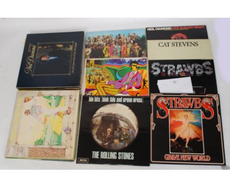 A collection of vinyl long play ( LP ) records to include The Rolling Stones big hits G/F STEREO TXS 101, The Beatles Sgt Pep