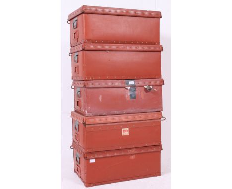 A good set of 5  vintage ochre coloured stacking trunks with lift off tops - notation plaques to front. H26 x W63 x D40cm 