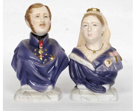  2 Royal Worcester candle snuffers /  Busts of Queen Victoria and Prince Albert bearing stamps to glazed interior 2001