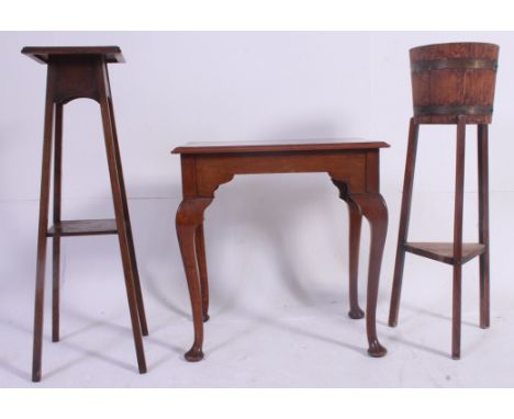 A Queen Anne style oak lowboy table raised on cabriole legs together with a barrel planter and a torchere - plant stand ( 3 t