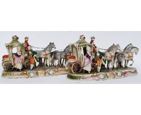 A pair of continental ceramic horse and carriage bookend figurine dioramas having blue crown markings to the base. L32 cm 