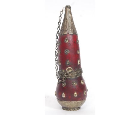 A 20th century Chinese carved nut water / powder flask. White metal mounted. H18 cm 