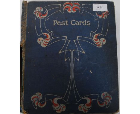A vintage album containing a collection of early 20th century greeting cards to include silk, embroidered, decorative example