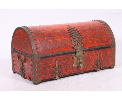 A decorative 20th century Armada dome top trunk chest with brass mounts and colourful decorated body