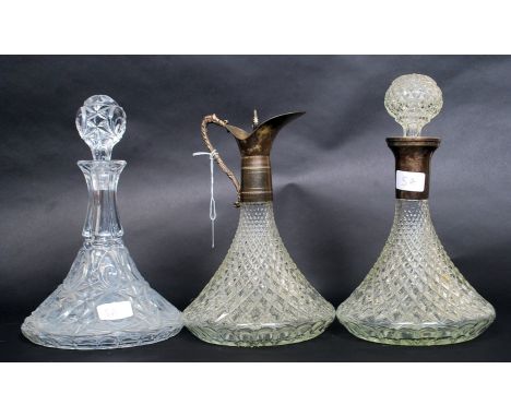 An early 20th century cut glass ships decanter together with a ships claret decanter and another. H29cm 