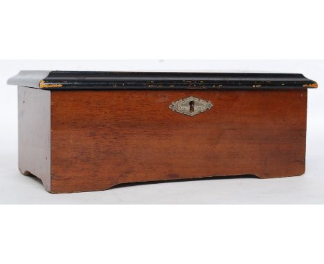 A 19th century Swiss musical / music box playing eight airs on a brass drum being set within a mahogany case with stencil det