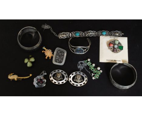 A collection of assorted vintage costume jewellery to include a Turkish white metal bracelet, Egyptian revival buckle and oth