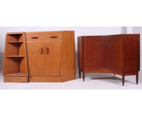 A rero vintage G-plan oak corner secretaire desk cabinet together with another angular G-plan corner cabinet, a tapering ligh