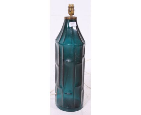 A stunning vintage 1970's Swedish retro blue glass table lamp in the for of a large bottle.  Bearing original label to side '