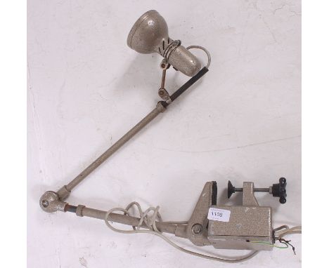 A vintage industrial Lumina Brevett industrial anglepoise style clamp on work lamps. 