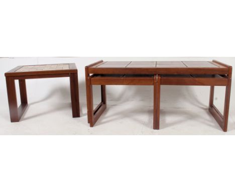 A retro 1970's retro teak and  tile top rectangular nest of tables. Each table with exellent inset tile work. Together with a