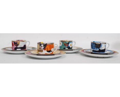 A set of 4 Rosina Wachtmeister tea cups and saucers, each marked to th the base with decorative scenes to each  - cats etc