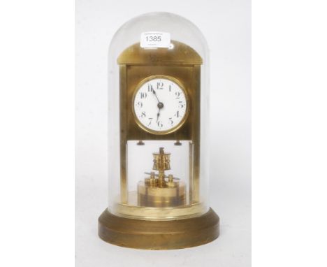 A good 20th century brass anniversary style clock having an enamel face with   numeral chapter ring all under a glass dome wi