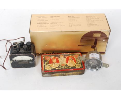 A vintage Smiths car clock, Eva - Blitz Electronic Flash along with a Fry's Bristol Souvenir tin