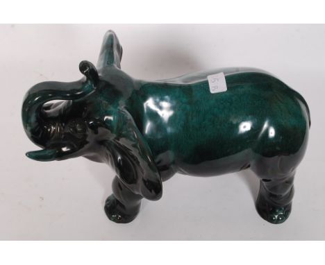 A very large ceramic Elephant of Canadian origin by Blue Mountain Pottery 38cm long