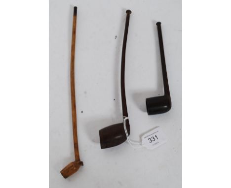 Two tobacco pipes of European form, possibly Ethnic African tribal origin being each carved from a single piece of wood. Toge