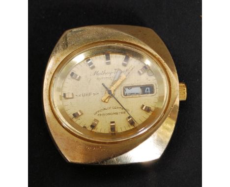 A Mathey-Tissot Automatique UHF officially certified chronometre. Yellow metal body with lozenge shaped facia, engine turned 