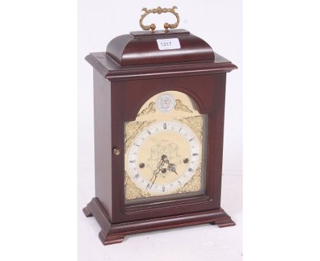 A contemporary Tempus fugit bracket clock by Stewart having good inset brass movement to the mahogany casef