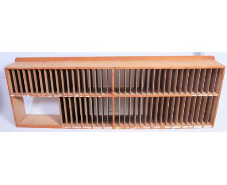 A large  vintage 1950's Industrial pigeon hole stationary cabinet having plain sides with fitment panels ( see illustrations 